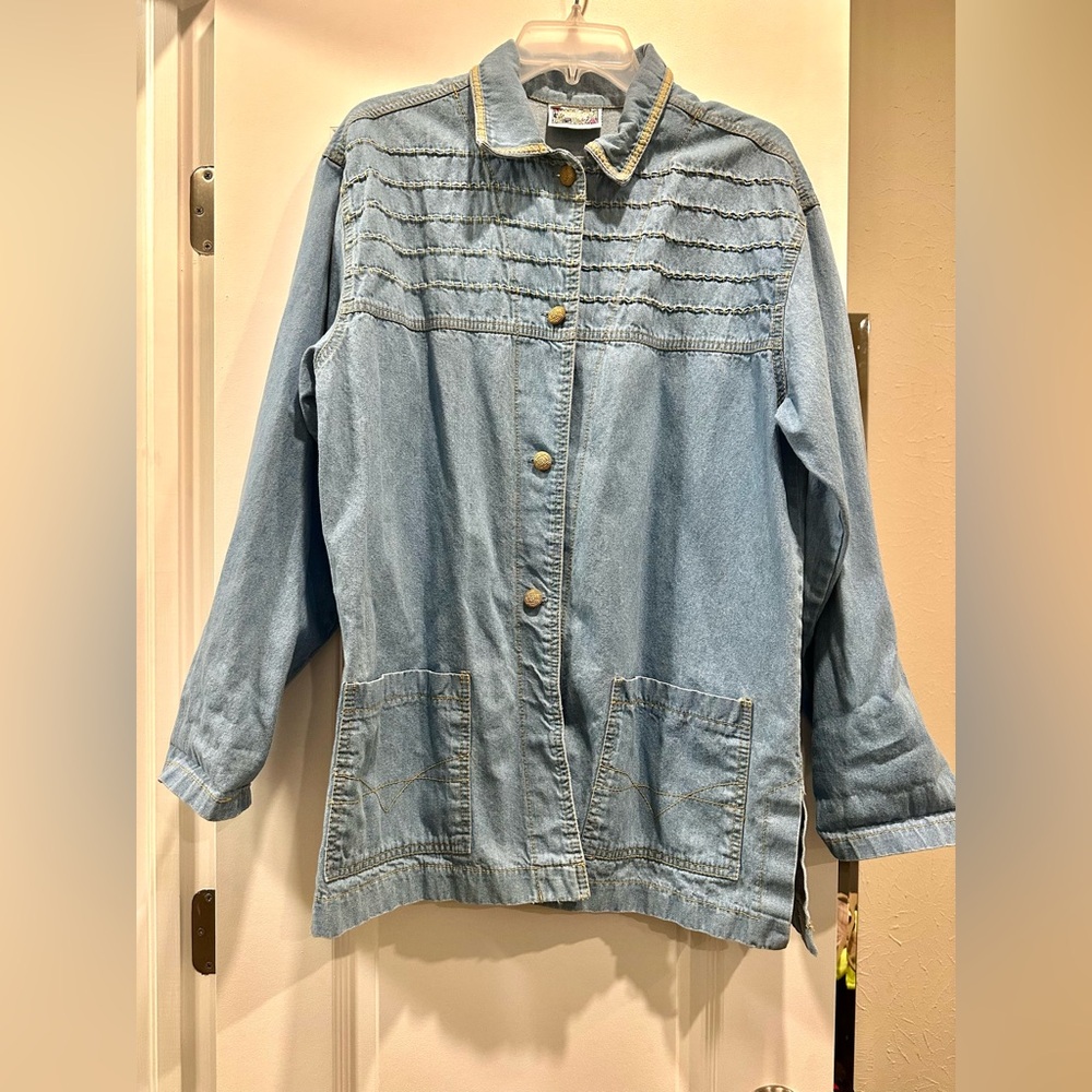 Monique Fashions women’s Blue Jean button down top/jacket with side slits.
